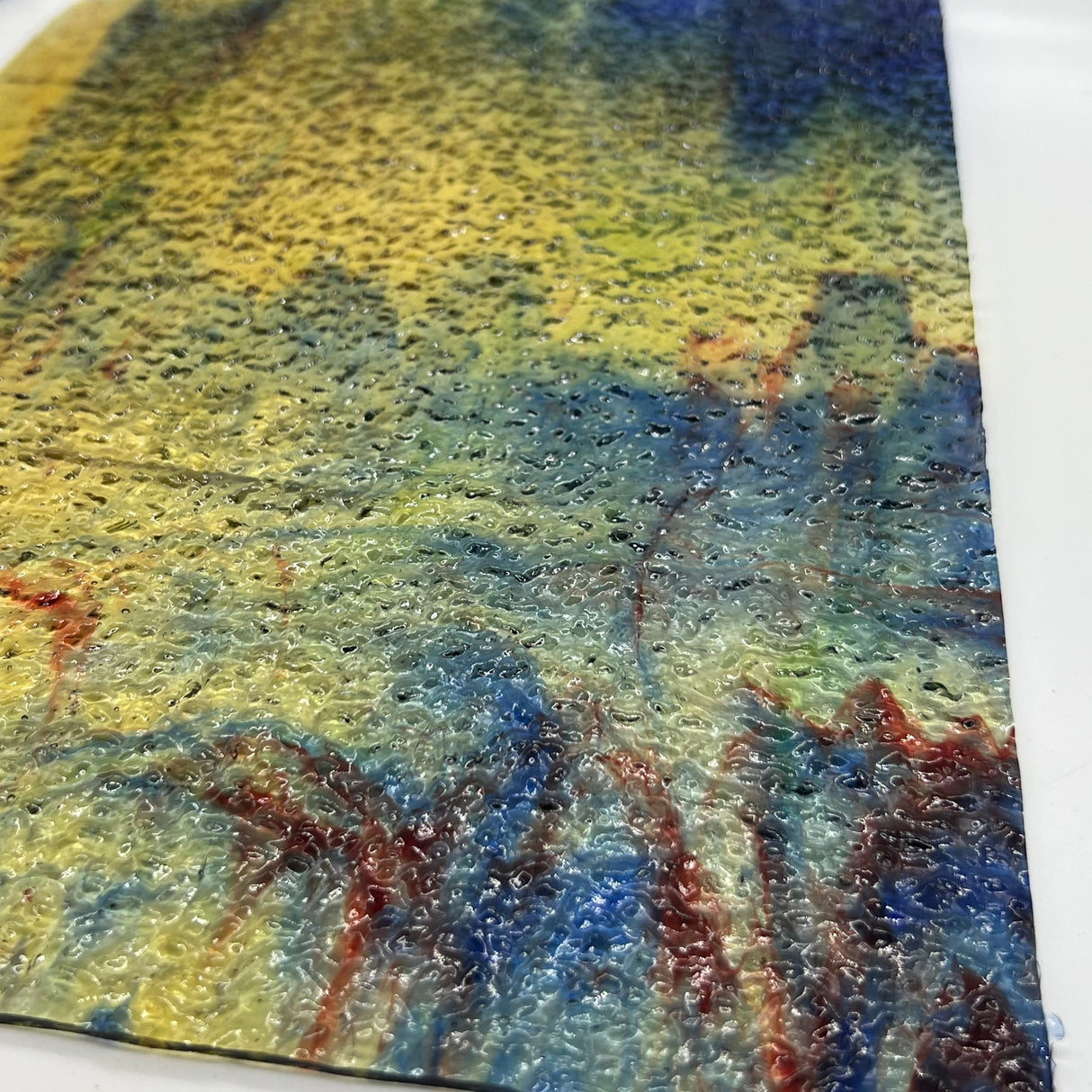 Amber with Blue, Red, Green and White Granite