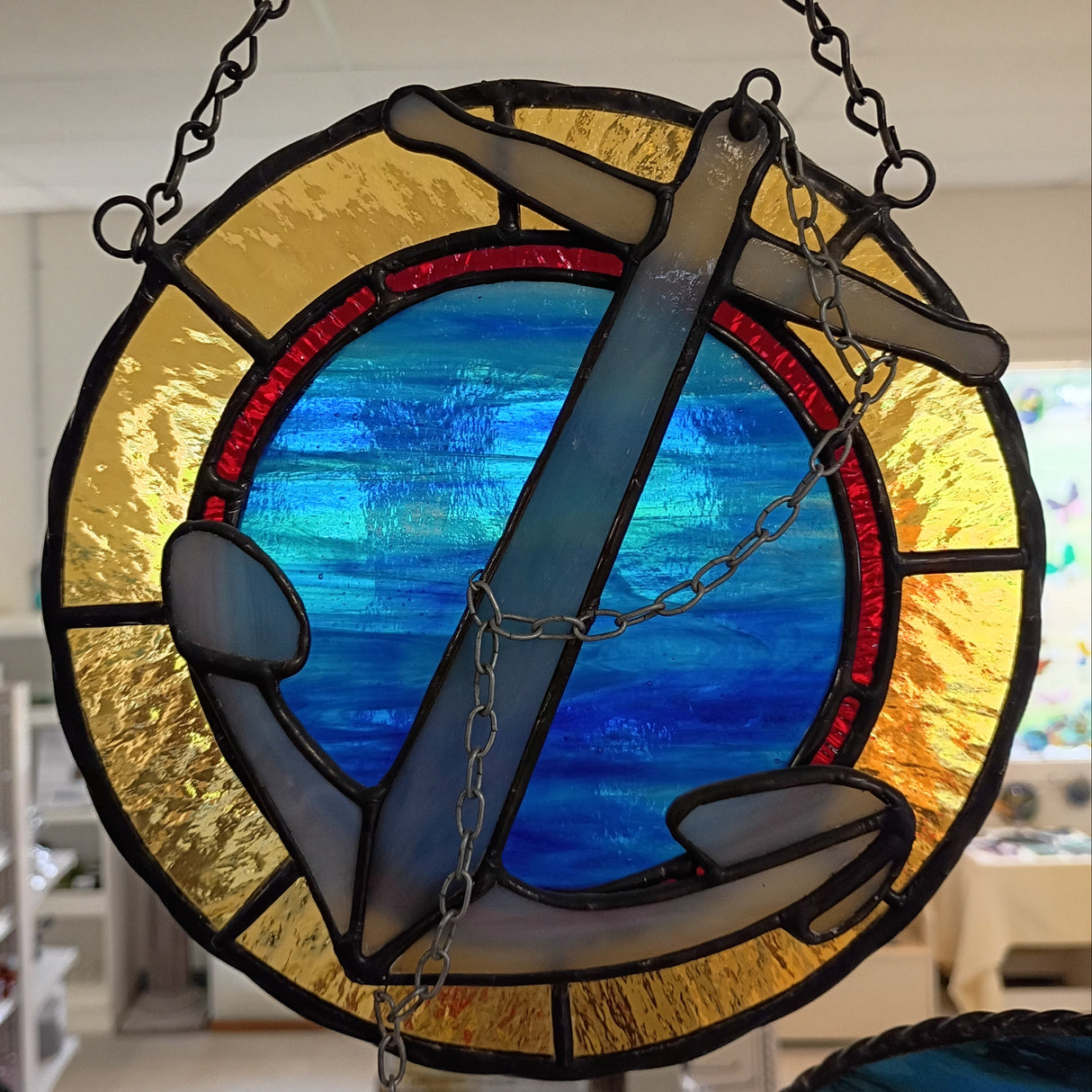 stained glass anchor emblem