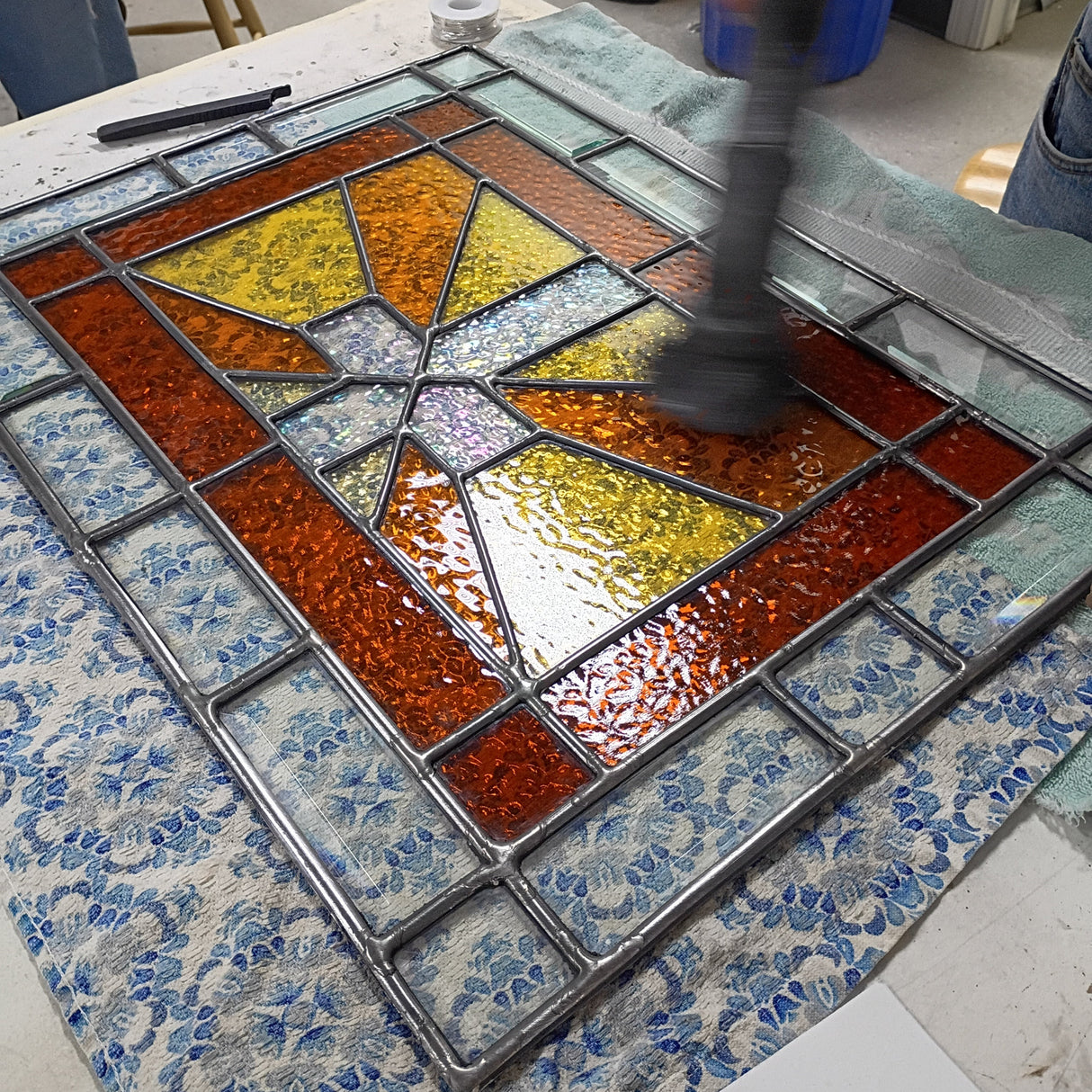 vacuuming the putty from a lead came panel