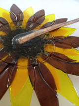 1/8" copper tube hammered flat and glued to back of fused glass flower