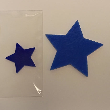 two blue precut glass stars