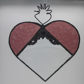large purple heart with filigree