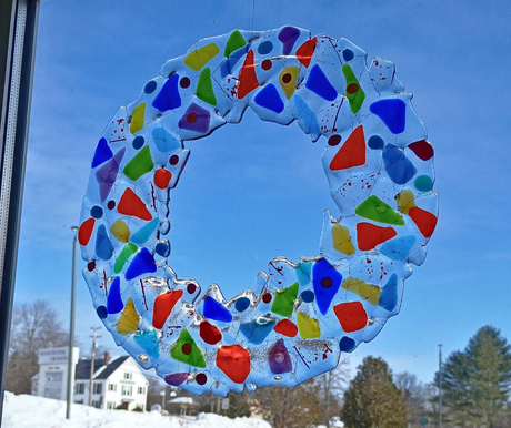 glass ice wreath in window
