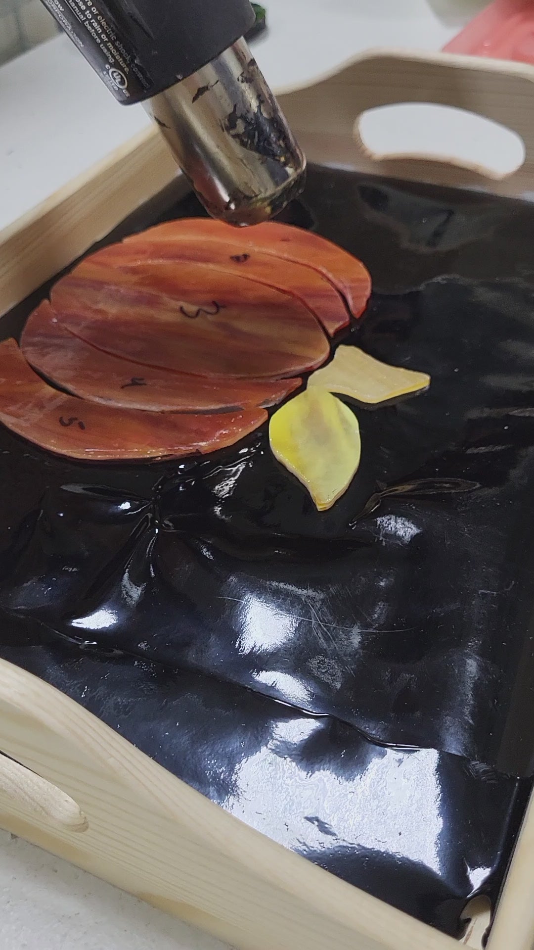 use a heat gun to activate the adhesive in No Days Groutless Mosaic Adhesive