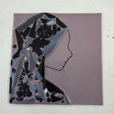 fused glass profile portrait in purple
